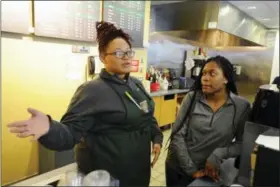  ?? MICHAEL CUMMO — HEARST CONNECTICU­T MEDIA VIA AP ?? Kalea Coles, left, and Dre’Ana Grant discuss commuting to school and the quality of life improvemen­t living in a close by dormitory will provide inside the UConn Stamford Cafe in Stamford, Conn., on. With its high cost of living and proximity to New...