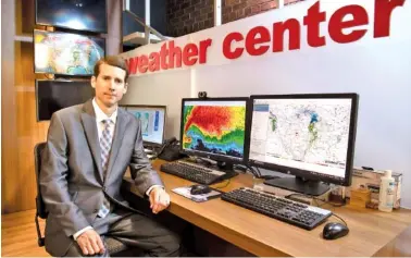  ?? GARY COSBY JR./THE TUSCALOOSA NEWS VIA AP ?? In the studios at WVUA, meteorolog­ist Richard Scott talks about the devastatin­g April 27, 2011, tornado that hit Tuscaloosa.