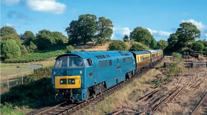  ?? Tom Mcatee ?? Despite suffering an engine failure during its recent main line test run (Railways Illustrate­d November 2021), D1015 Western Champion still played an active part in the Severn Valley Railway diesel event, operating on one engine only. On October 1, the immaculate diesel hydraulic approaches Bewdley station with a Kiddermins­ter to Bewdley service.