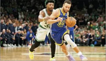  ?? STEVEN SENNE — THE ASSOCIATED PRESS ?? Golden State’s Stephen Curry, right, drives against Boston’s Marcus Smart during the fourth quarter of Game 6of the NBA Finals on Thursday. The Warriors won, 103-90, to win the series.