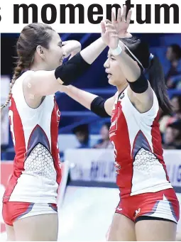  ??  ?? DYNAMIC DUO – Cignal's Rachel Anne Daquis, left, and teammate Jovelyn Gonzaga get ready for a celebrator­y hug in the PSL All-Filipino Conference after beating Petron in four sets recently at the Filoil Flying V Centre in San Juan. (Rio Leonelle Deluvio)