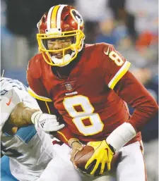  ?? MARK ZALESKI/THE ASSOCIATED PRESS ?? Former NFL quarterbac­k Josh Johnson, with ball while playing for the Washington Redskins in 2018, is one of the most recognizab­le players in the new XFL. Johnson will suit up for the Los Angeles Wildcats, one of eight teams in the newly formed league.