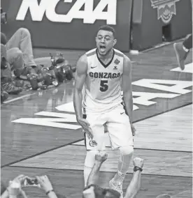  ?? DAVID WALLACE/AZCENTRAL SPORTS ?? Gonzaga's Nigel Williams-Goss reacts in the final seconds of a 77-73 win over South Carolina in a Final Four semifinal at University of Phoenix Stadium in Glendale on Saturday.