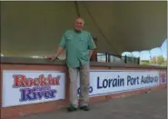  ?? RICHARD PAYERCHIN — THE MORNING JOURNAL ?? Rockin’ on the River Event Chairman Bob Earley said this year’s weekly concert series is ready to start May 26, 2017, at Black River Landing, the Lorain Port Authority’s riverfront festival site in downtown Lorain. There will be 21 shows this year...