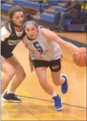  ?? PETE BANNAN – DIGITAL FIRST MEDIA ?? Springfiel­d’s Alyssa Long drives for the basket in a scrimmage against Olivia Dirks, left, and Episcopal Academy Tuesday afternoon. Long is fully recovered from an injury that cost her most of her sophomore lacrosse season.