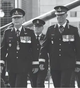  ?? JUSTIN TANG / THE CANADIAN PRESS FILES ?? Lt.-Gen. Jean-Marc Lanthier, right, has spoken with his commanders about adhering to the Armed Forces’ code of ethics, and setting a personal example.