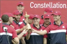  ?? AP photo ?? Team USA holds the trophy after defeating Europe in the Ryder Cup on Sunday. The next Ryder Cup is scheduled for Sept. 29-Oct. 1, 2023 at Marco Simone outside Rome.