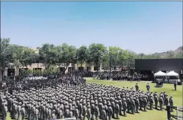  ?? Terry Tang ?? The Associated Press Hundreds of mourners, including Arizona law enforcemen­t officers, attend ceremonial honors Friday to fallen state trooper Tyler Edenhofer in Peoria, Ariz.