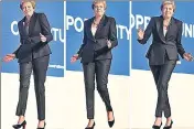  ?? AFP ?? Britain's Prime Minister Theresa May dances a few steps as she takes the stage at the Conservati­ve Party conference.