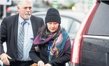  ?? DARRYL DYCK THE CANADIAN PRESS ?? Huawei CFO Meng Wanzhou arrives at a Vancouver parole office this month. While most Chinese-Canadians are of opposing opinions on her arrest, Karen Woods writes, many see the situation as enflaming China’s relations with the West.