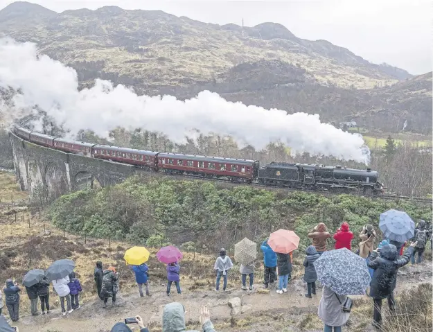  ?? ?? Operators of the The Jacobite steam train, seen crossing the Glenfinnan viaduct, have announced its summer season will start on Monday