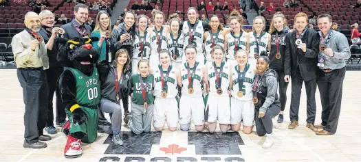  ?? GREG MASON • U SPORTS ?? The UPEI Panthers won a bronze medal at the U Sports women’s basketball championsh­ip. Front row, from left are Pride, trainer Danika Atchia, Jadyn Huggan, Reese Baxendale, Jenna Mae Ellsworth, Lexi MacInnis, Madison Orser and Kimeshia Henry. Second row, assistant coach Jay Mingrone, academic advisor Bob Gray, head coach Matt Gamblin, assistant coach Carolyn Huggan, Karla Yepez, Sydney Whitlock, Lauren Fleming, Annabelle Charron, Carolina Del Santo, Lauren Rainford, Reilly Sulllivan, Ashleigh Marshall, Lauren Harris, assistant coach Harris Campbell and athletics director Chris Huggan.