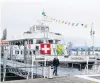  ?? PHOTO: REUTERS ?? A man walks near a Covid19 vaccinatio­n centre aboard the MS
Thurgau excursion boat in the harbour of Romanshorn on Lake Constance, Switzerlan­d, yesterday. The 89yearold passenger ship, out of commission due to the coronaviru­s pandemic, has been repurposed as a Covid19 vaccinatio­n centre for thousands of residents from cities on Lake Constance.