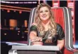 ??  ?? “Idol” alumna Kelly Clarkson lands on “The Voice.” NBC