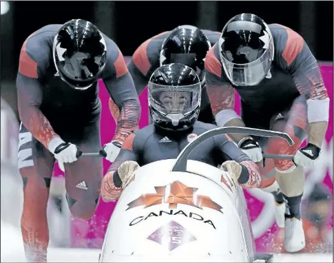  ?? THE ASSOCIATED PRESS ?? Chris Spring (centre) set an unofficial speed record of 154.5 km/h yesterday.