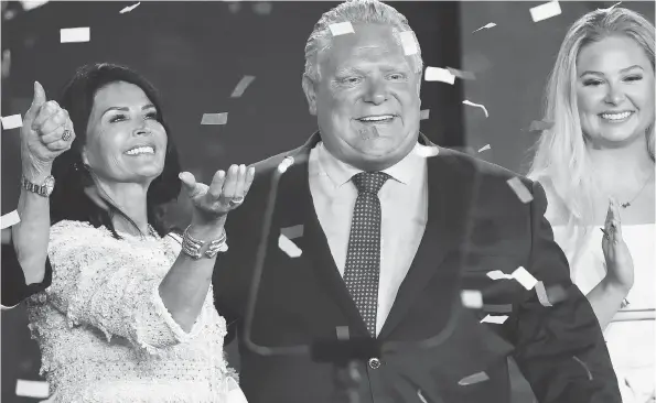  ?? NATHAN DENETTE / THE CANADIAN PRESS FILES ?? Doug Ford with his wife Karla, left, after winning the Ontario provincial election on Thursday to become the province’s new premier.