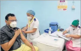  ?? SATISH BATE/HT PHOTO ?? Health workers administer the Covid vaccine in Mumbai on Saturday.
Sunetra Choudhury.
Did your office work closely in deciding the government response to the pandemic?