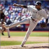 ?? FRED THORNHILL — THE CANADIAN PRESS VIA AP ?? New York Yankees starting pitcher Domingo German throws against the Toronto Blue Jays in the sixth inning of a baseball game in Toronto, Sunday.