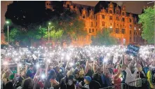  ?? DAVID CARSON/ST. LOUIS POST-DISPATCH ?? Hundreds of protesters chant “free our people” outside the St. Louis jail on Monday to show solidarity with those who remain behind bars. More than 120 people were arrested on Sunday.