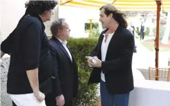  ??  ?? FLORIDA: In this file photo, actor and model Fabio, right, talks with Sean Spicer, President-elect Donald Trump’s choice for White House press secretary, at Mar-aLago in Palm Beach, Florida.
