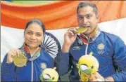  ?? PTI ?? ▪ Apruvi Singh, Ravi Kumar with their 10m air rifle mixed bronze.