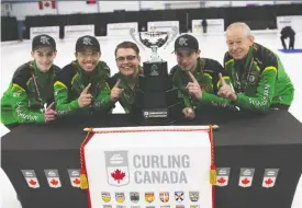  ?? ROBERT WILSON CURLING CANADA ?? Matthew Drewitz, Michael Hom, Carter Parenteau, Jared Tessier and coach Dale Neufeld of Saskatoon Nutana are national U-18 champions.