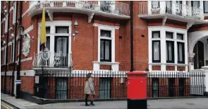  ?? PICTURE: ALASTAIR GRANT / AP ?? HOLED UP: WikiLeaks founder Julian Assange rarely emerges from the Ecuadoran embassy where he’s lived. Now his internet access has been cut, and It looks increasing­ly like the country is looking for a way out, says the writer.