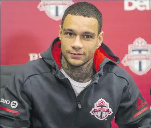  ?? ERNEST DOROSZUK/TORONTO SUN FILES ?? Gregory van der Wiel, shown during his introducto­ry news conference last week, has “fit in almost immediatel­y” with his Toronto FC teammates, according to coach Greg Vanney.