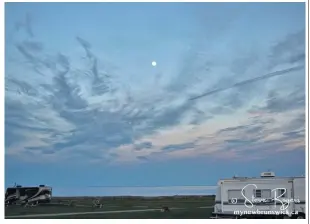  ??  ?? Steve Rogers snapped this one as the “almost” full moon was rising over the Bay of Fundy at St. Martins, N.B.