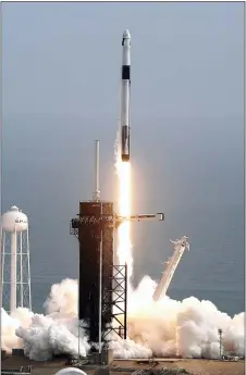  ?? JOHN RAOUX — THE ASSOCIATED PRESS ?? A Falcon 9 SpaceX rocket lifts off from pad 39A during a test flight to demonstrat­e the capsule’s emergency escape system at the Kennedy Space Center in Cape Canaveral, Fla., Sunday.