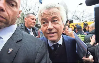 ?? AFP/GETTY IMAGES ?? Geert Wilders and his Freedom Party are in the lead in national elections March 15.