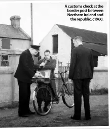  ??  ?? A customs check at the border post between Northern Ireland and
the republic, c1960.