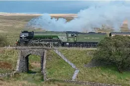  ?? MANDY GRANT/A1SLT ?? Peppercorn A1 Pacific No. 60163 Tornado heads across Ribblehead Viaduct on the Settle and Carlisle line on September 28, 2019.