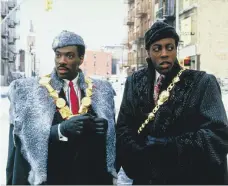  ?? Paramount Pictures ?? Eddie Murphy, left, and Arsenio Hall in ‘Coming to America.’ The film launched the careers of several black actors