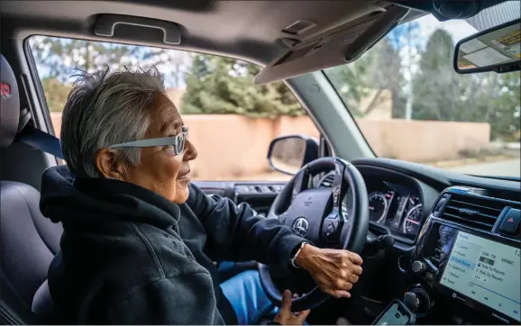  ?? NATHAN BURTON/Taos News ?? Uber driver Ramona Montoya drives through Taos as she waits for customers to schedule a ride Monday (March 13).