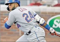  ?? APAP ?? ON THE HOOK: Robinson Cano was suspended for the 2021 season, but his presence on the Mets still helped lure free agent Starling Marte to New York.