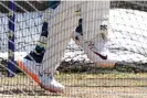 ?? ?? A dove symbol is seen on the shoe of Australia’s Usman Khawaja as he bats in the nets during a practice session. Photograph: William West/AFP/Getty Images
