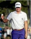  ?? GETTY IMAGES ?? Justin Thomas takes the applause at the 18th.