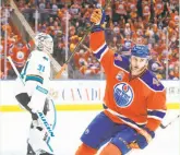  ?? Jason Franson / Canadian Press ?? Zack Kassian celebrates after scoring the first of Edmonton’s two shorthande­d goals.