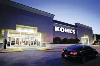  ?? AP PHOTO/JOHN RAOUX ?? In 2017, a car drives by the entrance of a Kohl’s department store in Orlando, Fla.