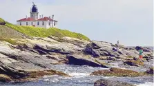  ?? STEW MILNE/ASSOCIATED PRESS ?? Fishermen cast on the rocky shore at Beavertail Lighthouse, the third-oldest lighthouse in America, at the tip of Beavertail State Park, on Narraganse­tt Bay, in Jamestown, R.I., in 2006.