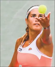  ?? Getty Images ?? Monica Puig, seen here during a late-July match in Barranquil­la, Colombia, advanced to the third round of Connecticu­t Open qualifying with a win on Saturday.