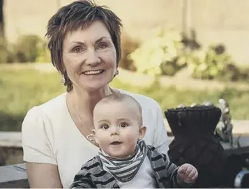  ??  ?? 0 Jenny Ackland with her four-year-old grandson Callum, who she looks after three days a week