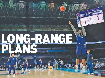  ?? THE ASSOCIATED PRESS ?? Villanova’s Eric Paschall shoots during a Final Four practice session Friday at the Alamodome in San Antonio. All four of the teams in tonight’s national semifinals have averaged at least 7.5 3-pointers made per game this season.