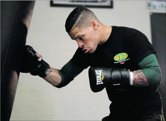  ?? — GETTY IMAGES FILES ?? Orlando Cruz works out in preparatio­n for his fight against Orlando Salido. Boxing’s first openly gay fighter, Cruz will don rainbow colours on his trunks during his Saturday night bout. It’s his way of supporting the gay and lesbian community.
