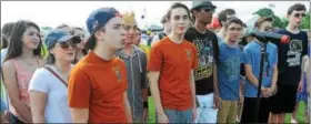  ??  ?? Members of the Spring-Ford High School choir sing during the opening ceremony of the Pottstown Area Relay For Life.