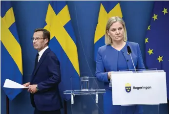  ?? AP ?? Swedish Prime Minister Magdalena Andersson and leader of the opposition Ulf Kristersso­n announce Sweden’s intention to apply for Nato membership in Stockholm