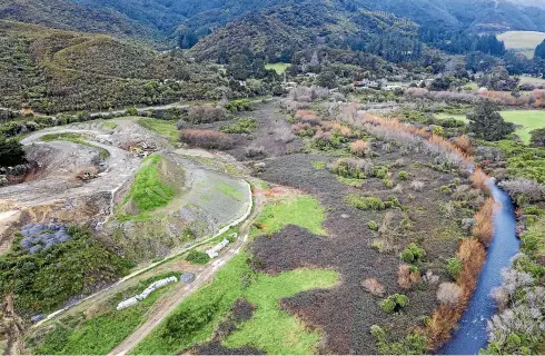  ??  ?? Residents fear the expansion of the cleanfill site will throw the regenerati­on of Wainuiomat­a River into doubt.