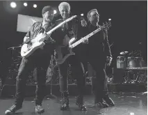  ?? THE ASSOCIATED PRESS ?? The Edge, left, Adam Clayton and Bono perform at the 13th MusiCares MAP Fund benefit concert in New York City.