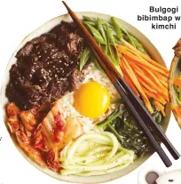  ??  ?? Bulgogi bibimbap with kimchi